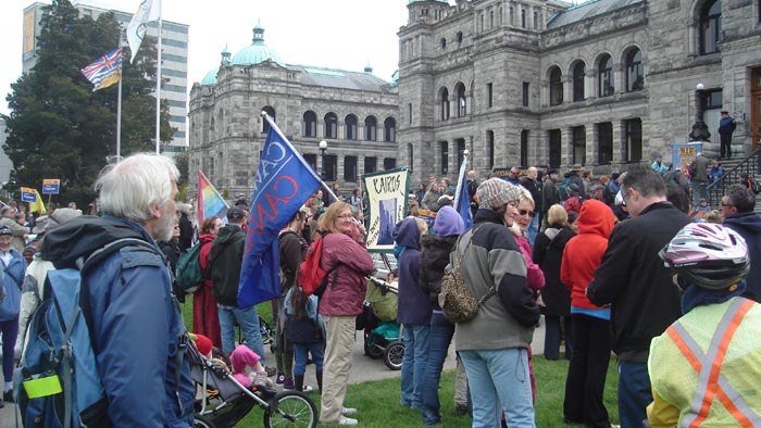 Sarah Dutsch (with CAW Flag) at Earth Day Rally in Victoria